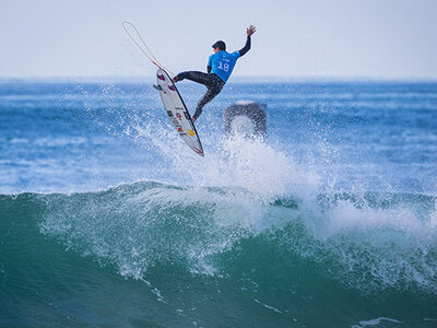 Image: WSL / Damien Poullenot | Caption: Gabriel Medina (BRA) takes to the air. 