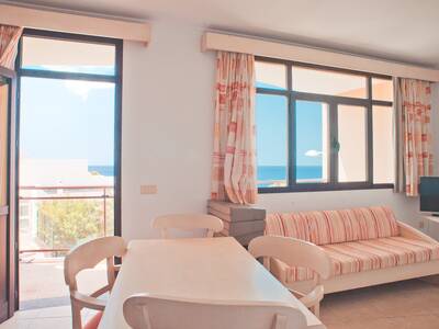 Living room with balcony and sea view in the family flat