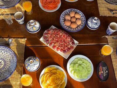 A table brimming with healthy, energizing breakfast foods at the original Surf Morocco camp